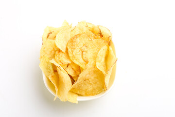 potato chips in bowl on white background.