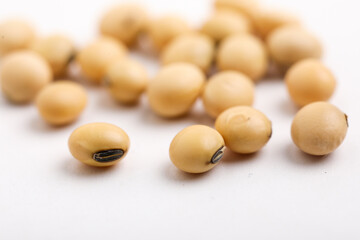 Dry soybean seed on white background.