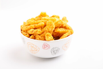 Delicious Homemade kurkure snack on white background.