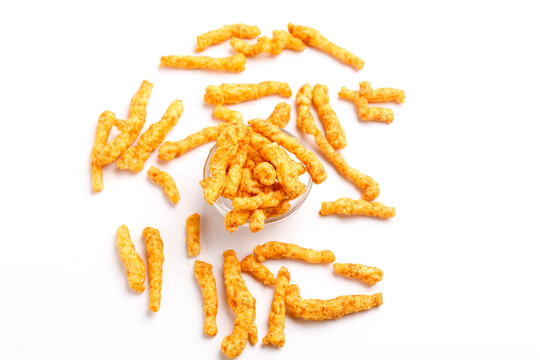 Delicious Homemade kurkure snack on white background.