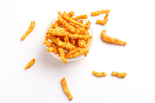 Delicious Homemade kurkure snack on white background.
