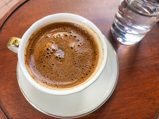 top view beautiful Turkish coffee and glass of water