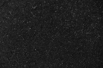 Black textured background. Dark rubber background with rough pattern