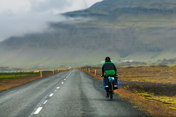 Touring bicyclist in Iceland - Drives on the road - summer season