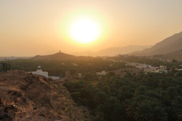 Birkat Al Mouz Ruins and a valley of palm trees