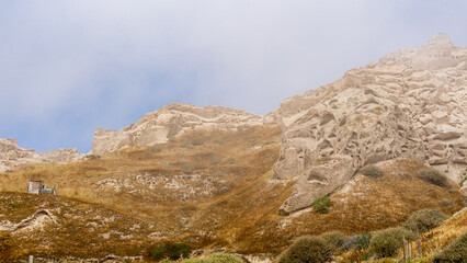 Lunar landscape: Mist rolls in among the bizarre pumice rocks of Moon Beach near Vlychada
