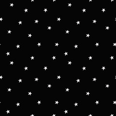 Seamless pattern with stars on a dark background
