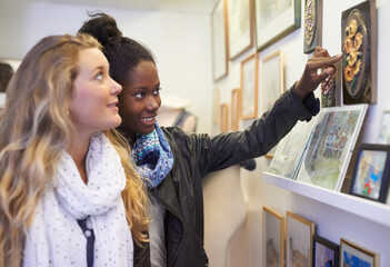 I like this work.... Two art students admiring some art in a gallery.