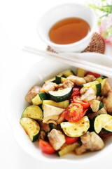Chinese food, zucchini and chicken stir fried with Chinese meat