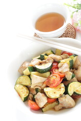 Chinese food, zucchini and chicken stir fried with Chinese meat