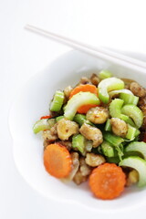 Chinese food, chicken soft bone and celery stir fried carrot