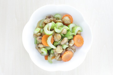 Chinese food, chicken soft bone and celery stir fried carrot