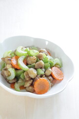 Chinese food, chicken soft bone and celery stir fried carrot