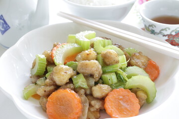 Chinese food, chicken soft bone and celery stir fried carrot
