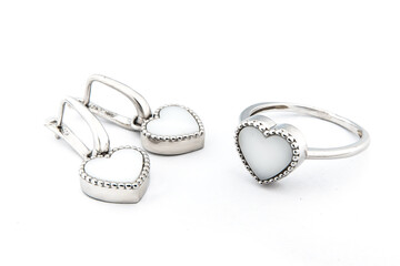 Silver jewels collection with crystals in minimalism style. Silver set of earrings and silver necklace