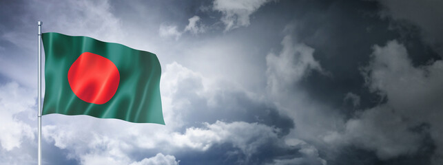 Bangladesh flag on a cloudy sky