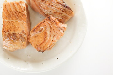 Canned food, grilled salmon on dish for emergency food image