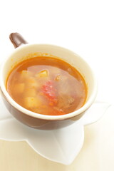 Homemade minestrone soup, in cup for healthy breakfast