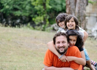 Fototapeta premium Portrait of happy family together in nature