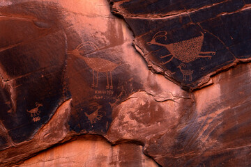 Some petroglyphes on a rock in Monument Valley