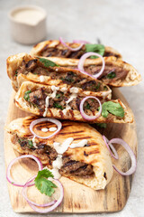Arayes- pita bread filled with a mixture of minced meat with different spices