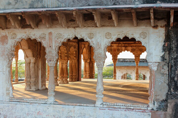 Beautiful arches of a pavilion lit by the evening lit during golden hour in the historic Lohagarh...