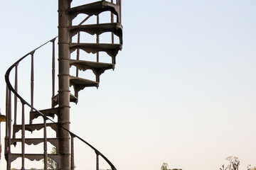 Detail of a spiral staircase against the background of a sky in an ancient palace in Rajasthan.