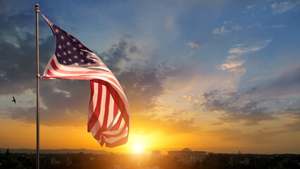 American flags on sunset background. Independence Day concept. USA holiday.