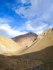 Sand mountains with sky and clouds