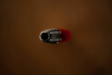 top view of a plastic lighter isolated in close up