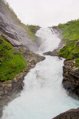 beautiful view of waterfalls and green nature in norway