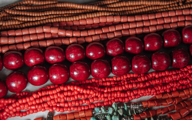 ethnic necklaces of red colors close up