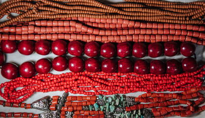 ethnic necklaces of red colors close up