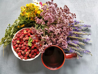 forest medicinal herbs for tea and strawberries. 
