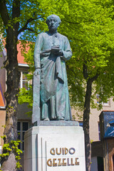 Monument to Guido Gezelle in Old Town of Brugge, Belgium