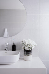 Modern bathroom in white tones style with sink and mirror