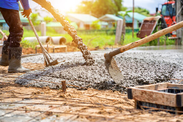 Wet concrete in concrete road construction site