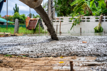 Wet concrete in concrete road construction site