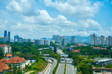Wide highway heading to the city. Top view