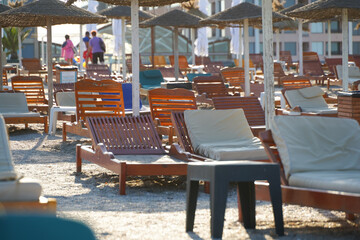 Beach. sunbeds on a beach. photo during the day.