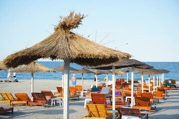 Beach. sunbeds on a beach. photo during the day.