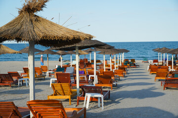 Beach. sunbeds on a beach. photo during the day.