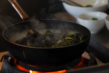 pan-fried shells in wine sauce. photo inside.