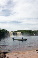 Fototapeta na wymiar Walk through the Canaima lagoon. The Ax jump. Sailing in a Curiara on the river
