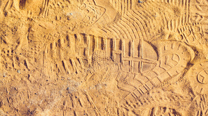 Footprints in the sand. Textures on sand