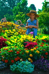 Naklejka premium Little girl with flowers