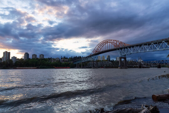 Pattullo Bridge in New Westminster and Surrey, Greater Vancouver, British Columbia, Canada. Sunset Sky. Brownsville Bar Park.