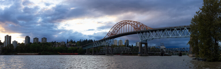 Pattullo Bridge in New Westminster and Surrey, Greater Vancouver, British Columbia, Canada. Sunset Sky. Brownsville Bar Park.