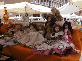 Flea market. Group of vintage dolls for sale.