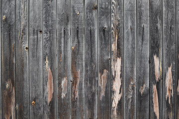 Old weathered wooden fence background . Rustic style wood texture
